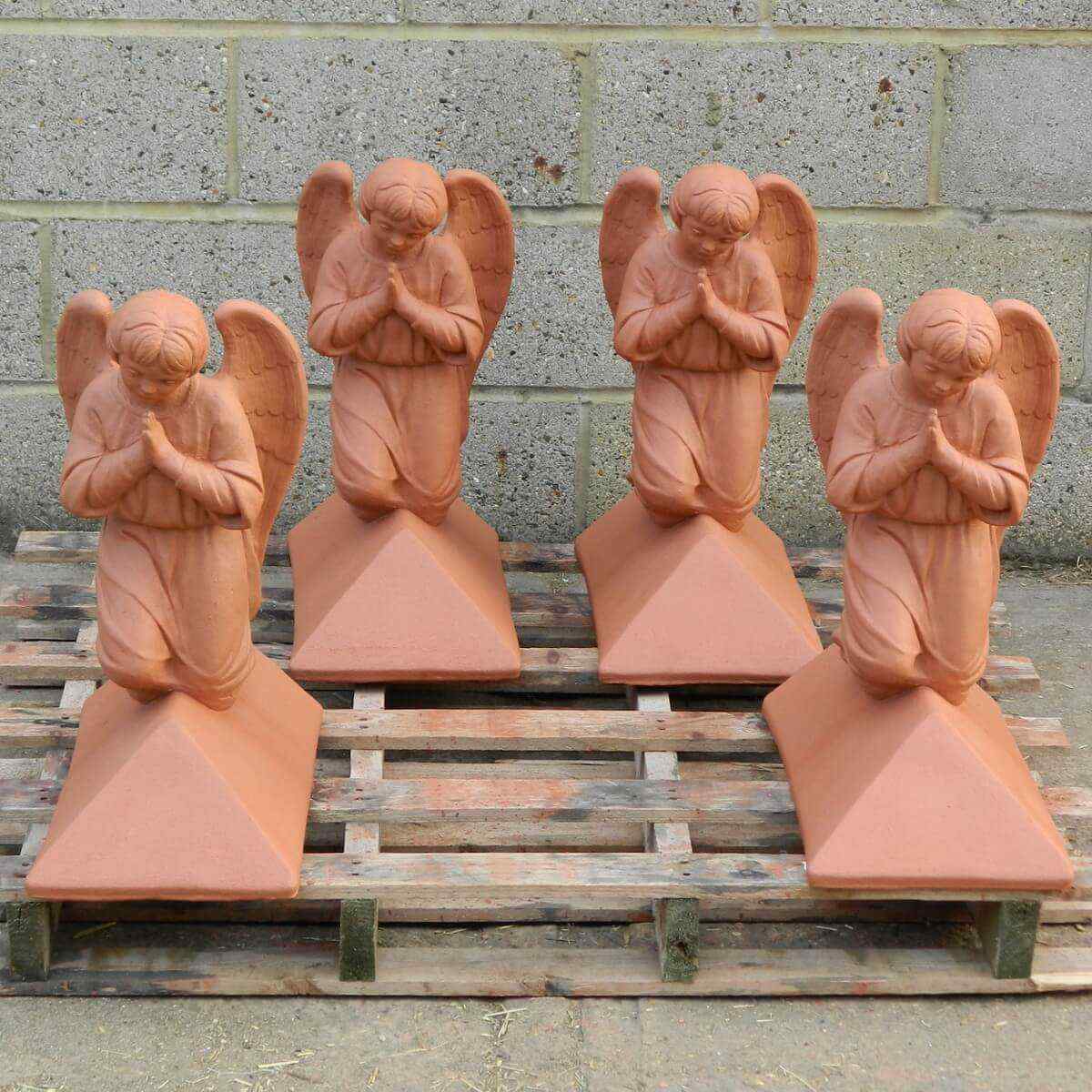 angel roof finials on pallet.jpg